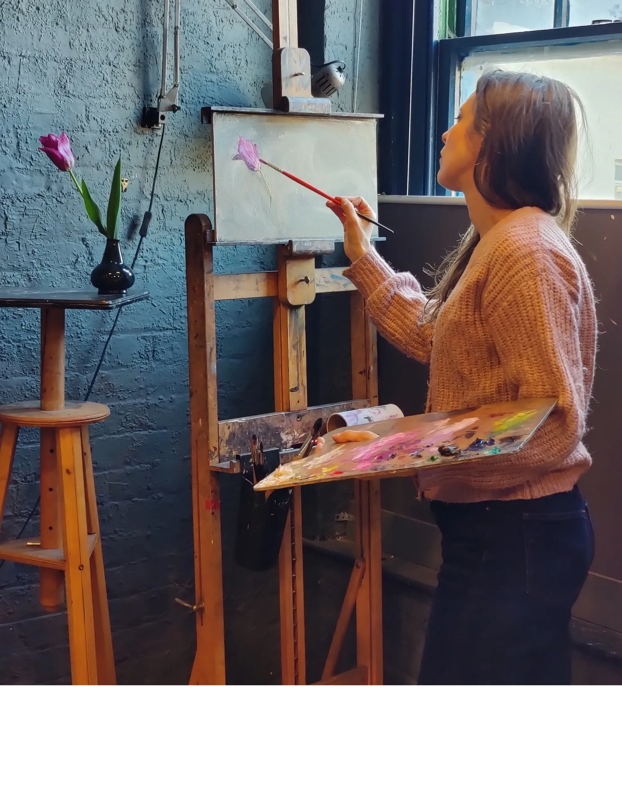 Cristina Vercesi painting in her studio